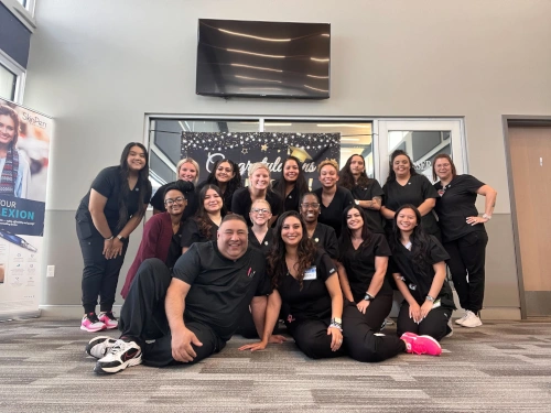 medical assistant students and instructors posing for class photo